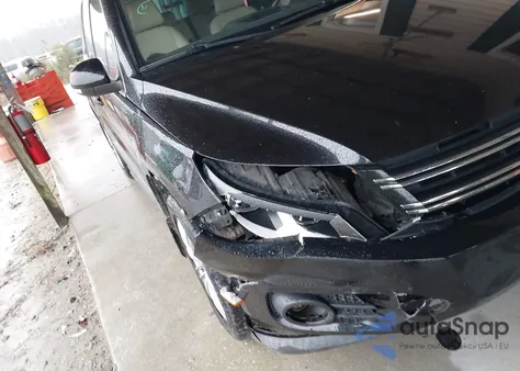 2014 Volkswagen Tiguan Sel из США, поврежденный, VIN WVGBV3AX3EW596678